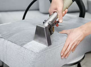 Upholstery cleaning on a sofa